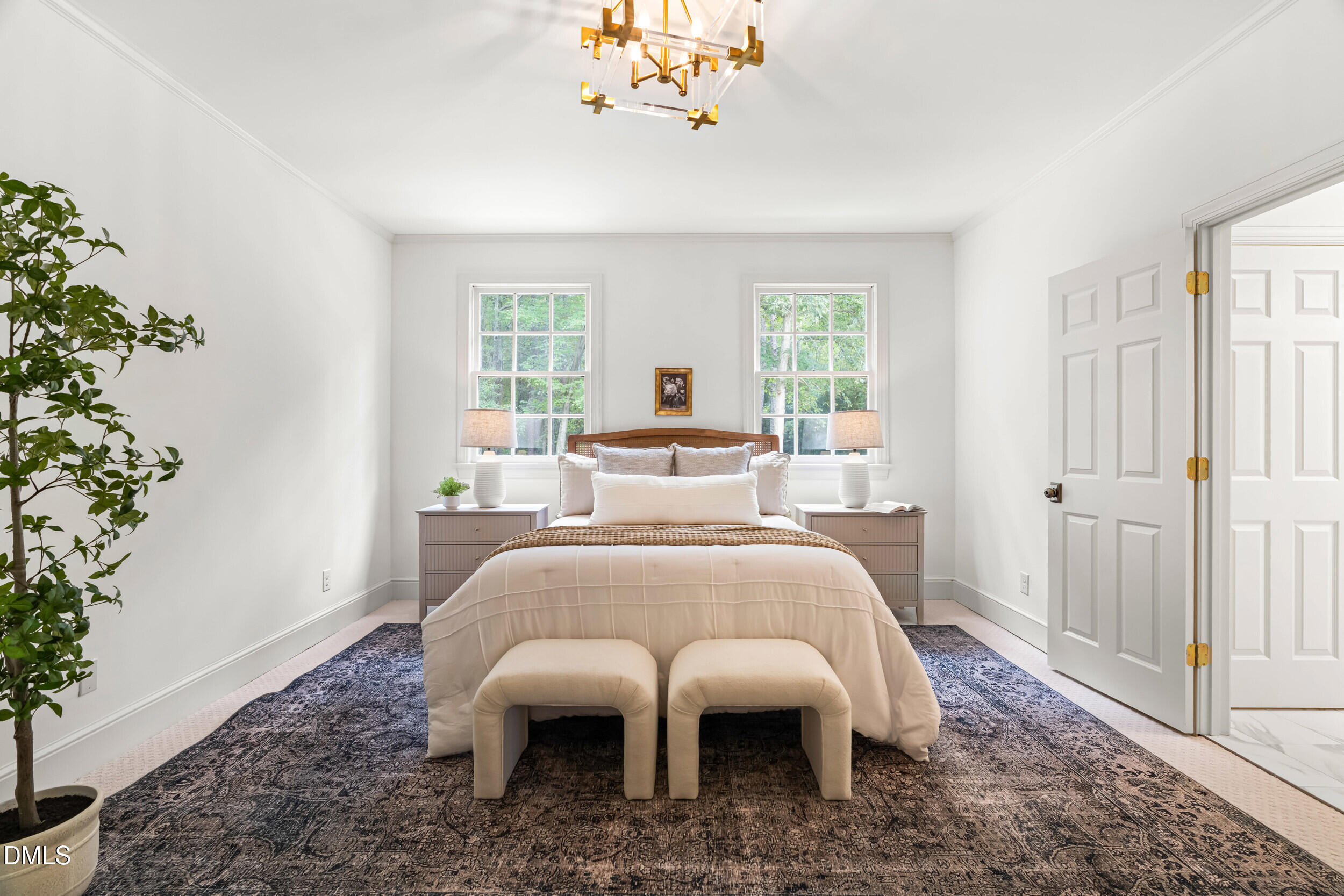 1015 Mulberry Road Clayton, NC 27520 - Photo 24 of 46 a bed room with a bed and a window