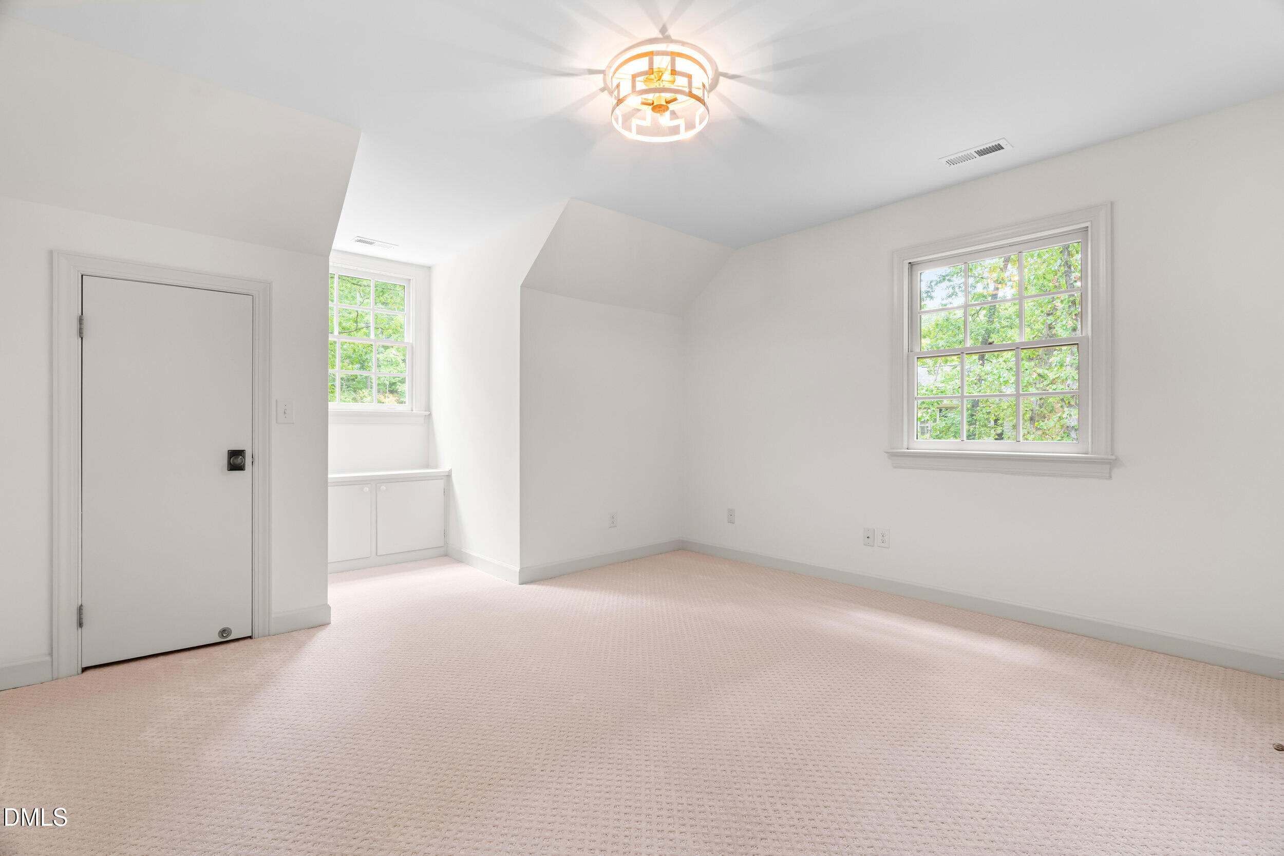 1015 Mulberry Road Clayton, NC 27520 - Photo 32 of 46 an empty room with windows