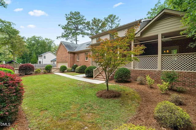 a view of a balcony with wooden floor and stairs