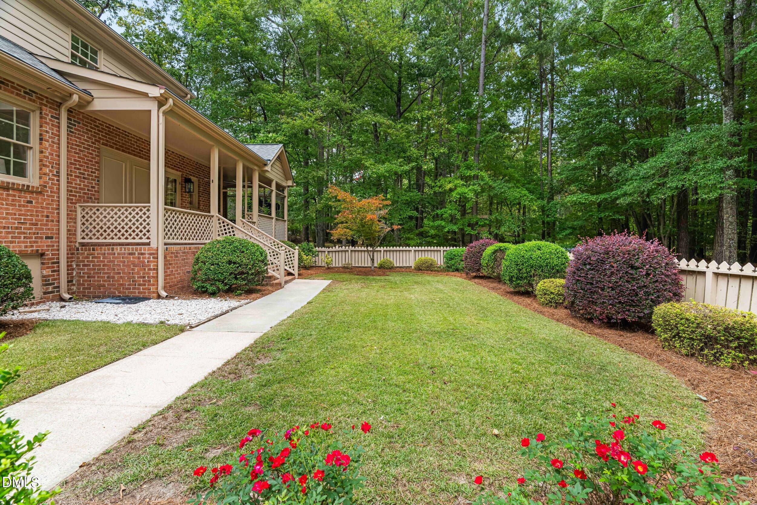 1015 Mulberry Road Clayton, NC 27520 - Photo 41 of 46 a house view with a garden space