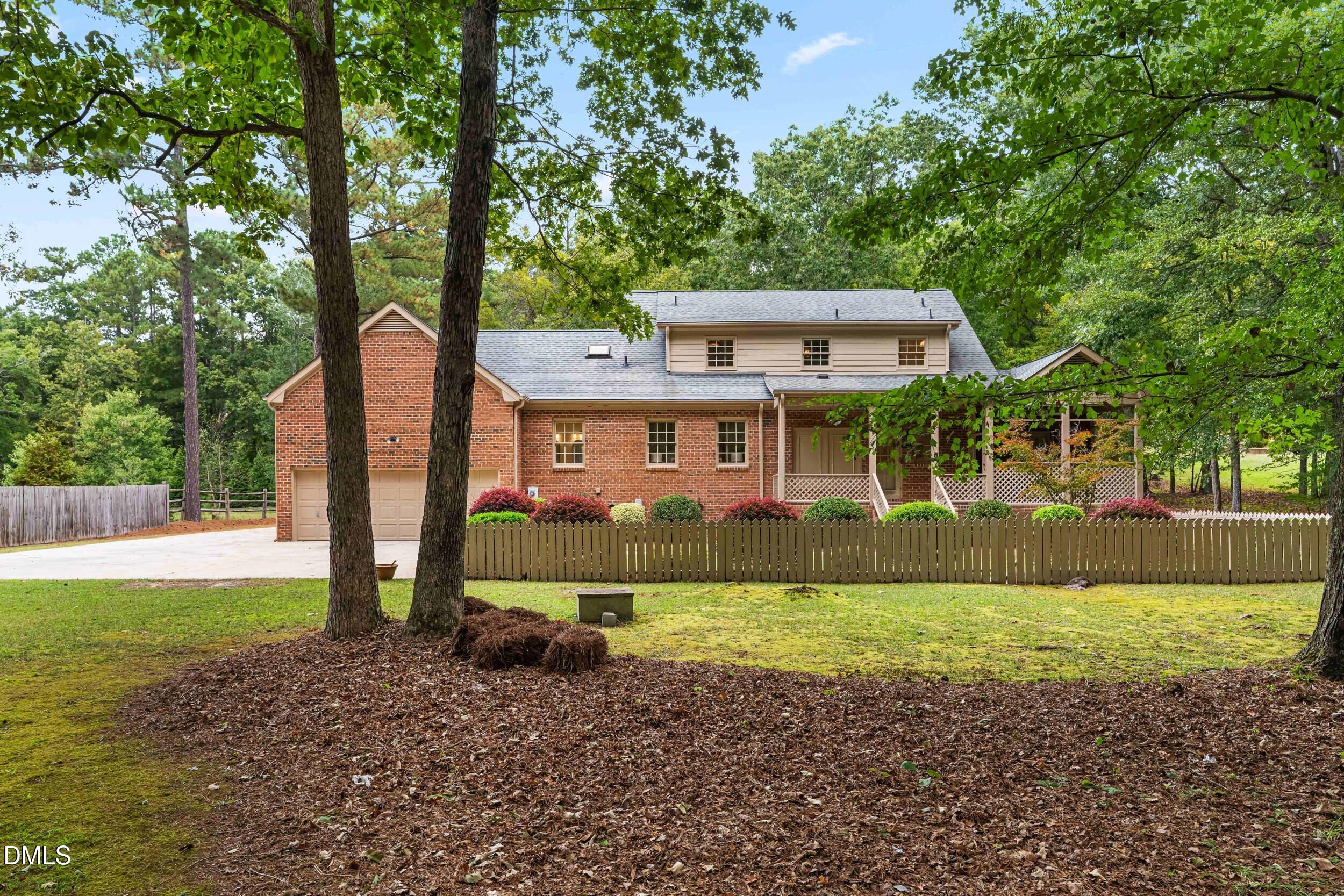 1015 Mulberry Road Clayton, NC 27520 - Photo 43 of 46 a front view of a house with a yard