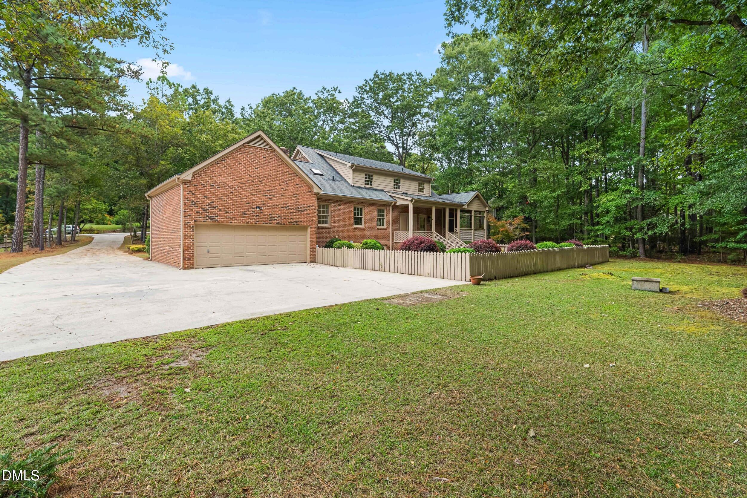 1015 Mulberry Road Clayton, NC 27520 - Photo 45 of 46 a view of house with yard and entertaining space