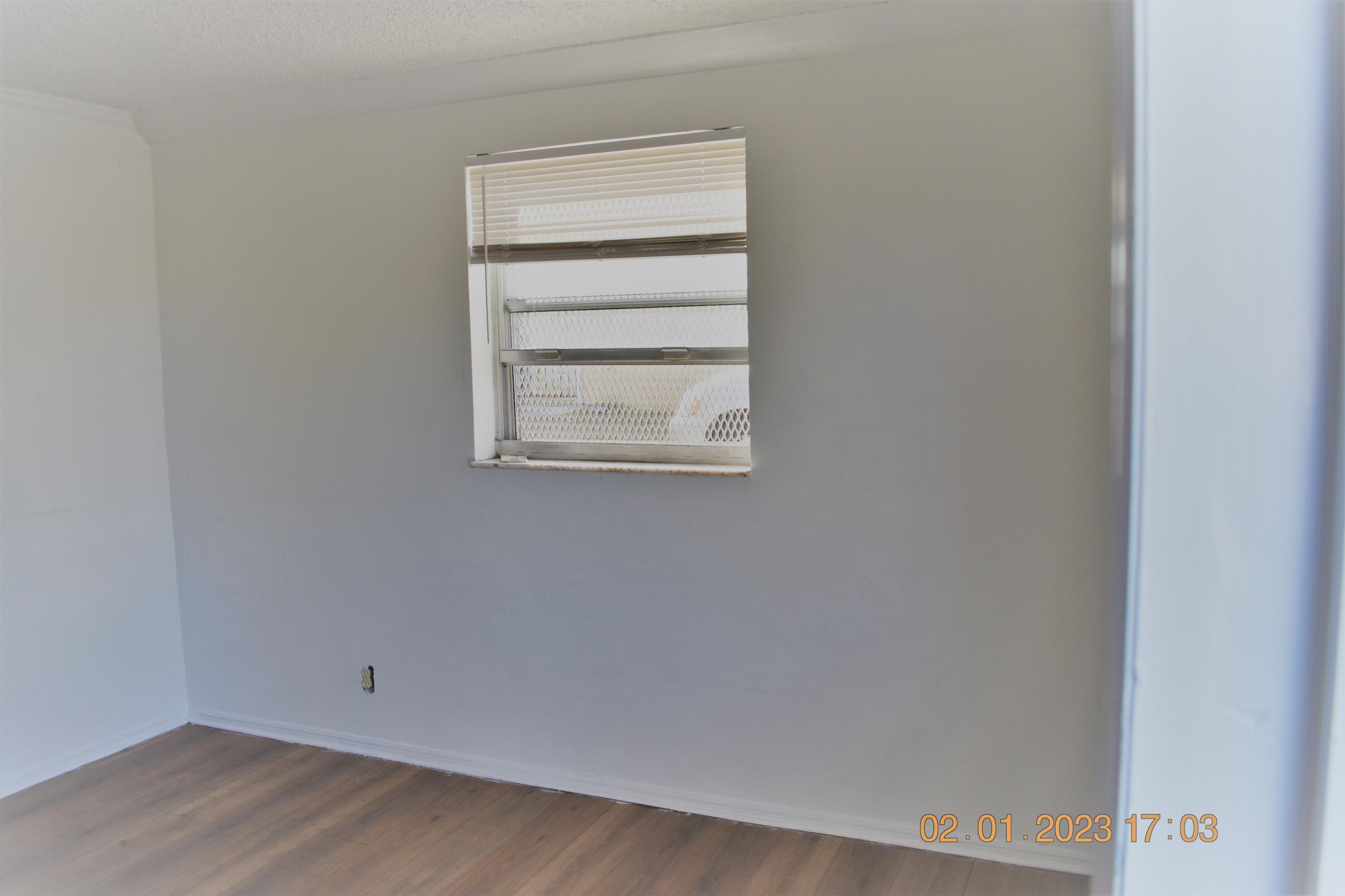 1305 West 25th Street Riviera Beach, FL 33404 - Photo 8 of 10 a view of a small space with window