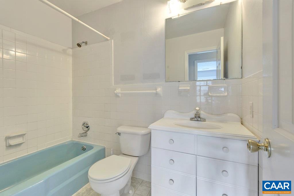 2411 Wakefield Road Charlottesville, VA 22901 - Photo 8 of 22 a bathroom with a sink a toilet and shower