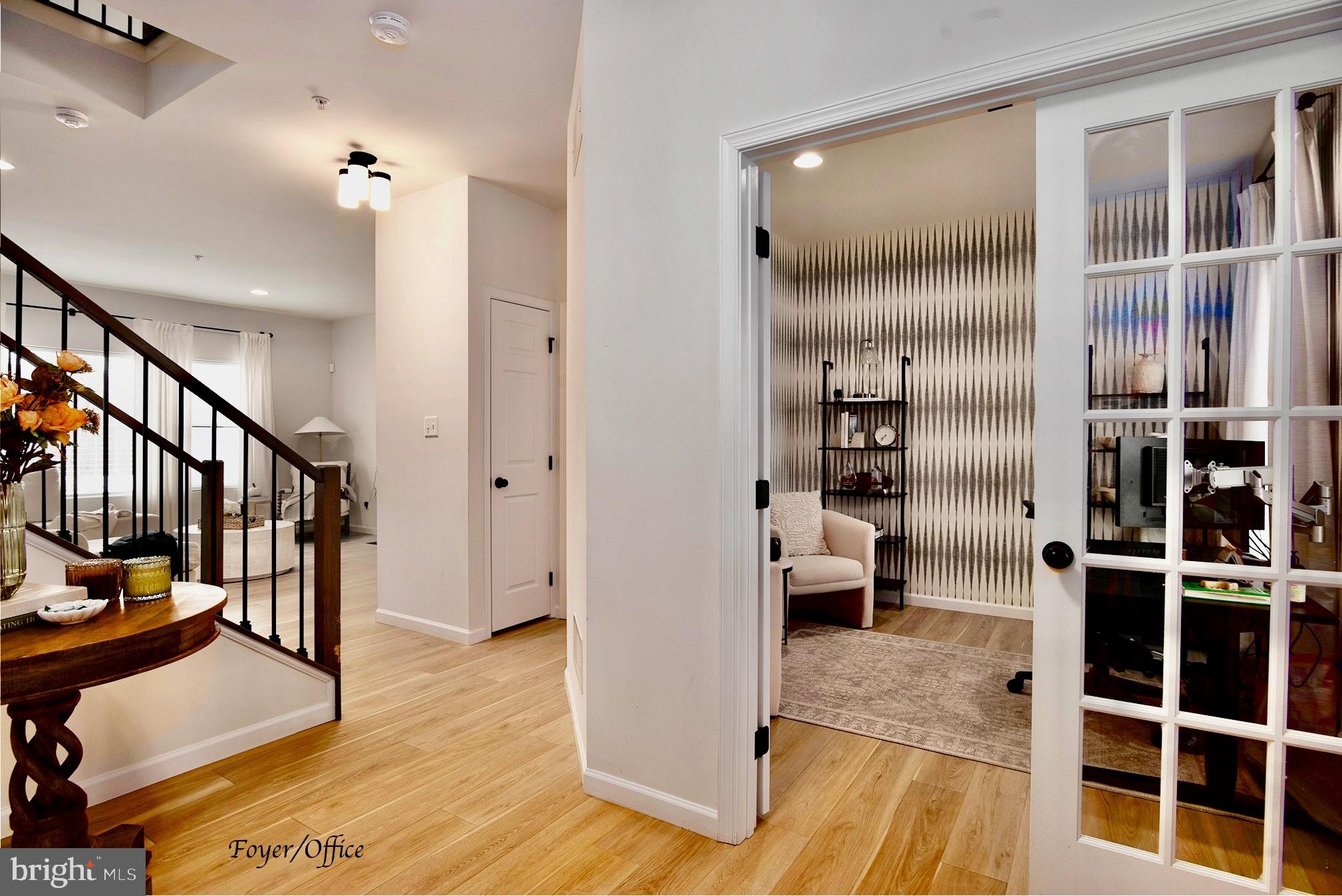 194 Cool Springs Road North East, MD 21901 - Photo 6 of 39 a view of a hallway with wooden floor and windows