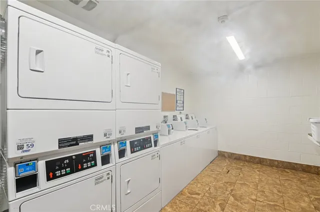 a view of cabinets and washer dryer