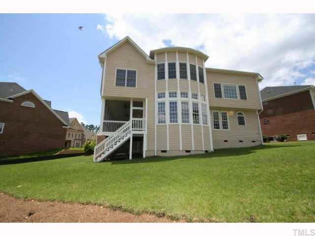 2005 Falls Farm Crossing Raleigh, NC 27614 - Photo 2 of 12 a front view of a house with a yard