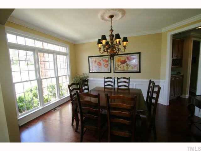 2005 Falls Farm Crossing Raleigh, NC 27614 - Photo 5 of 12 a view of a dining room with furniture window and outside view