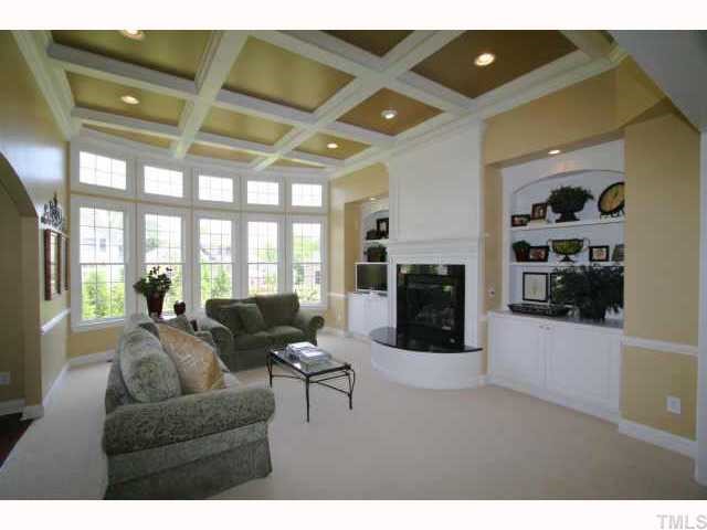 2005 Falls Farm Crossing Raleigh, NC 27614 - Photo 6 of 12 a living room with furniture and a fireplace