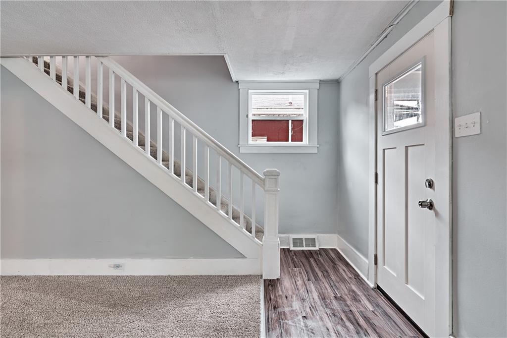 408 20th Street Beaver Falls, PA 15010 - Photo 16 of 27 a view of entryway with wooden floor