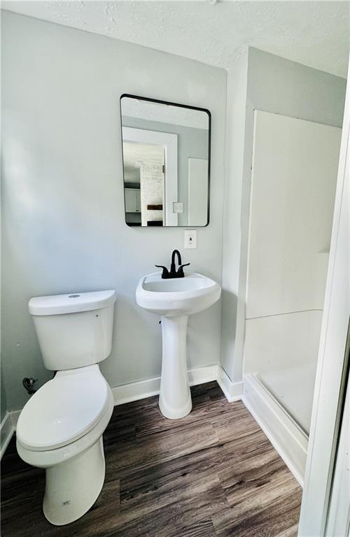 408 20th Street Beaver Falls, PA 15010 - Photo 23 of 27 a bathroom with a toilet sink and mirror