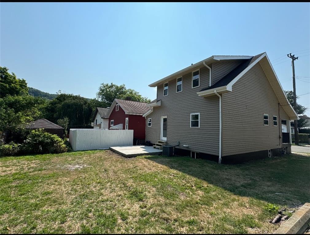 408 20th Street Beaver Falls, PA 15010 - Photo 24 of 27 a house view with a garden space