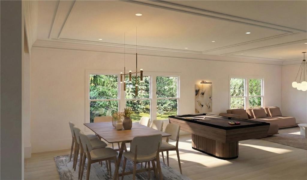 212 Lask Lane Milton, GA 30004 - Photo 11 of 42 a living room with a table and a potted plant