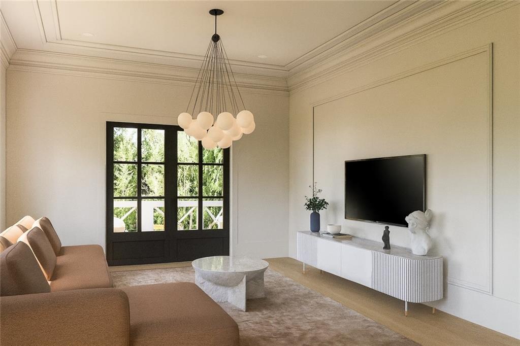 212 Lask Lane Milton, GA 30004 - Photo 12 of 42 a living room with furniture and a flat screen tv