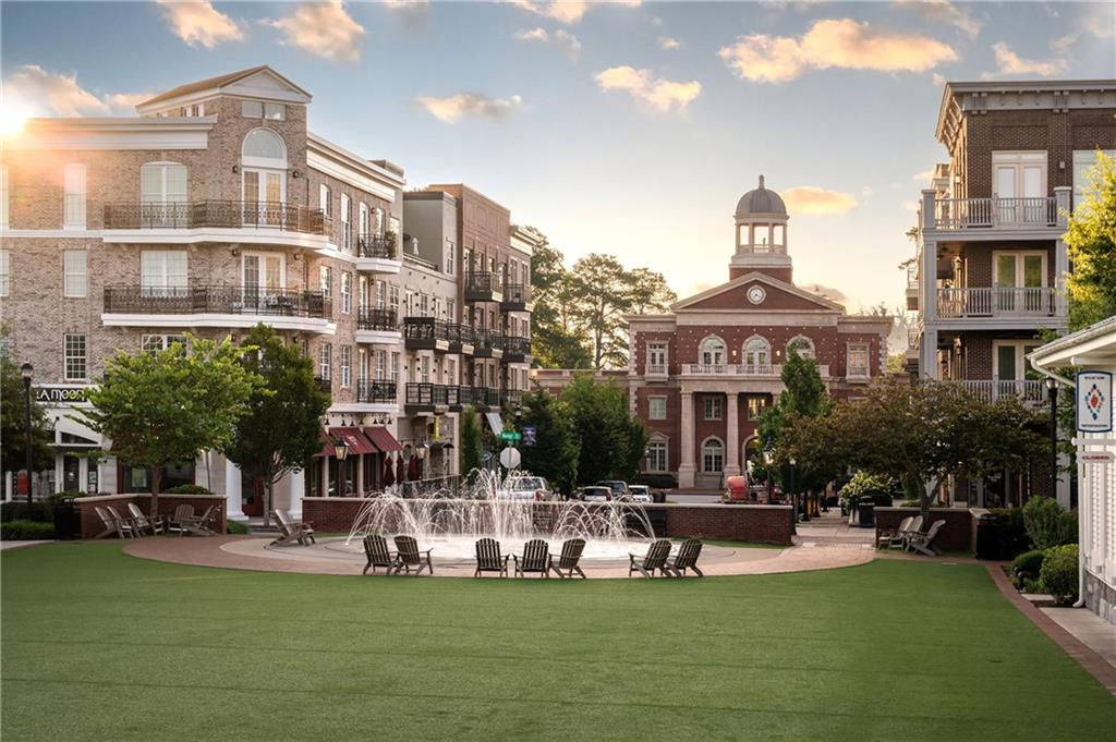 212 Lask Lane Milton, GA 30004 - Photo 37 of 42 a front view of building with yard and outdoor seating