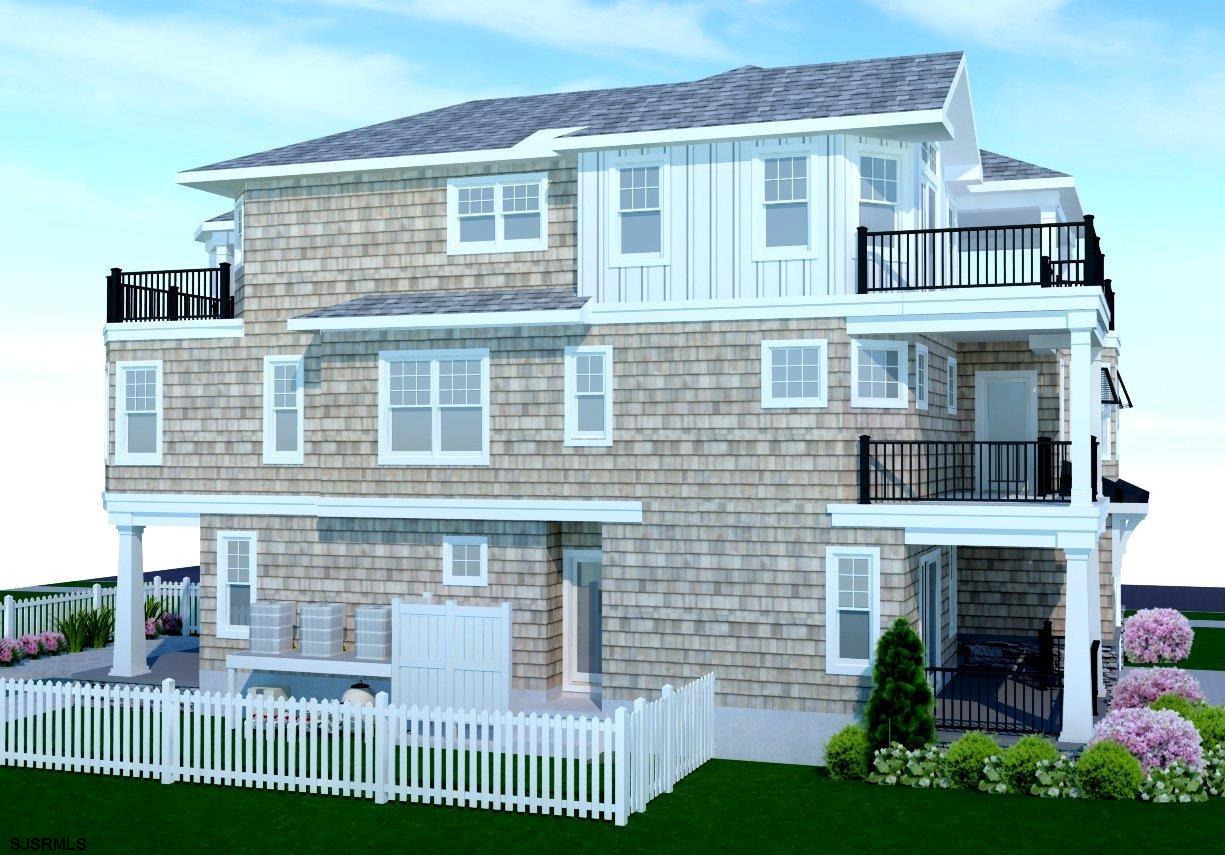1700 Ocean Avenue Brigantine, NJ 08203 - Photo 7 of 27 a front view of a house with a garden and plants