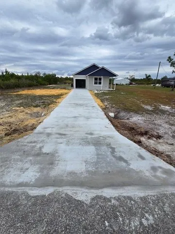 a front view of house with ocean view