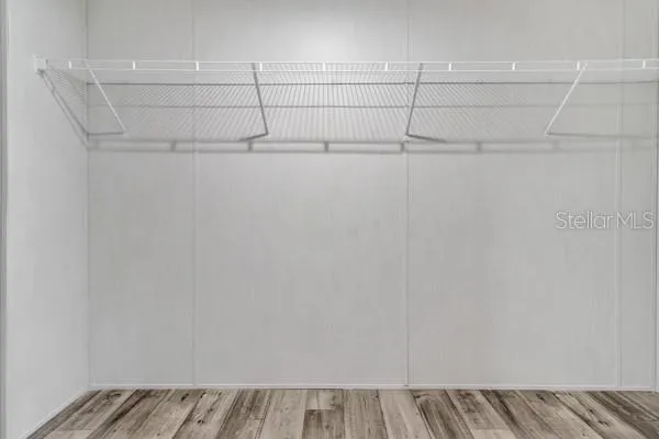 a view of a room with racks on the wall