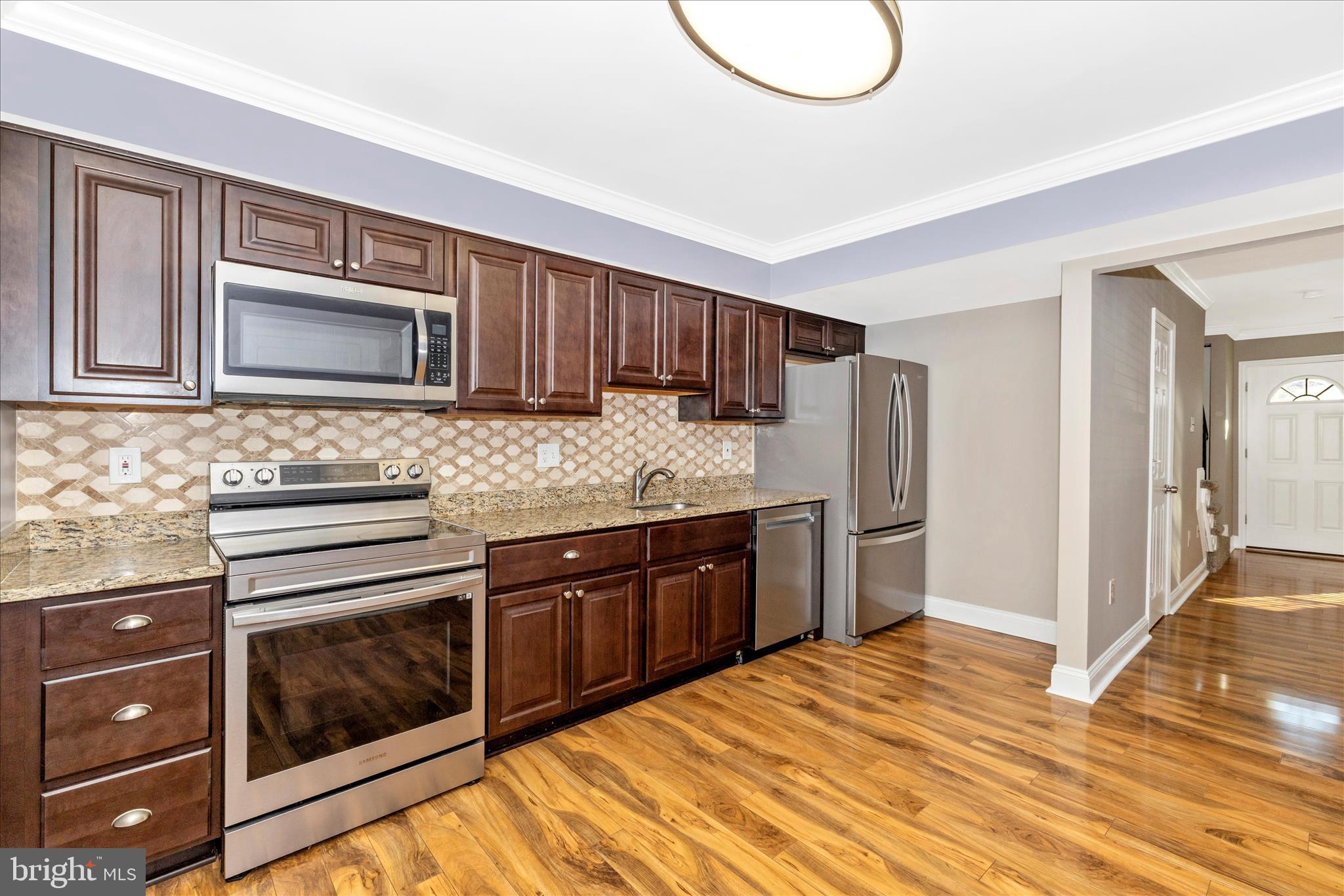 557 Lancaster Place, Unit 557 Frederick, MD 21703 - Photo 8 of 26 Kitchen & Dining