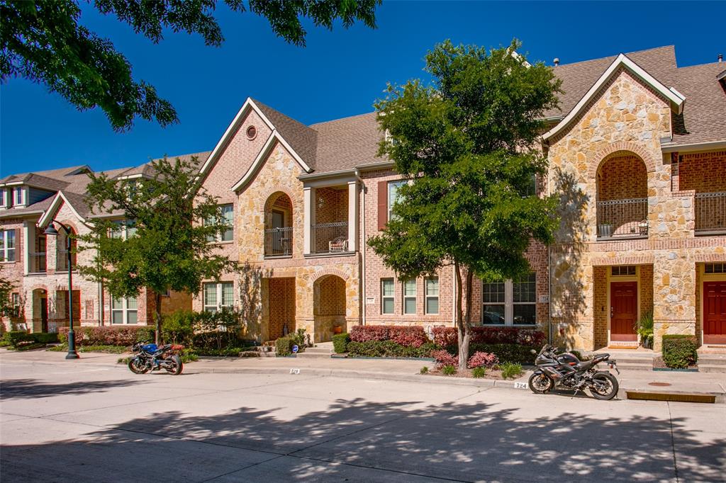 a front view of a house with a outdoor space