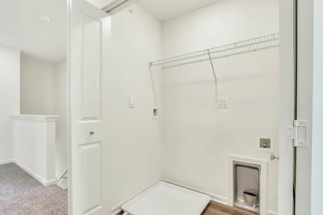 a view of a patio with a yard