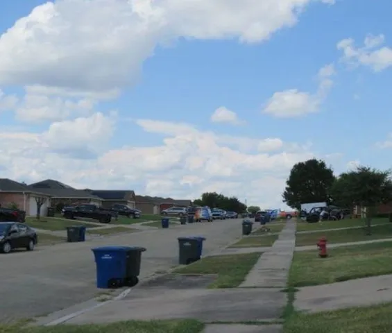 a view of a terrace with yard and mountain view