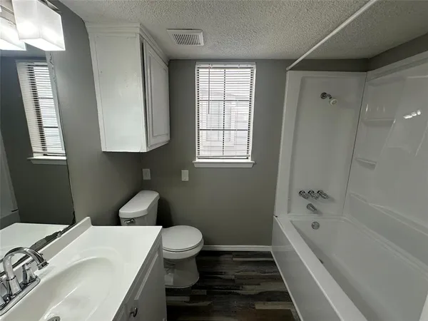 a bathroom with a bathtub