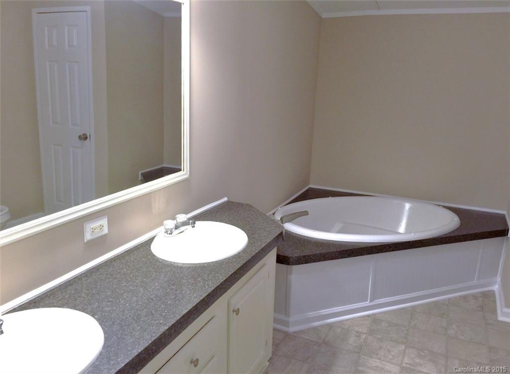 1915 Burkin Road McConnells, SC 29726 - Photo 13 of 16 a bathroom with a sink and a mirror