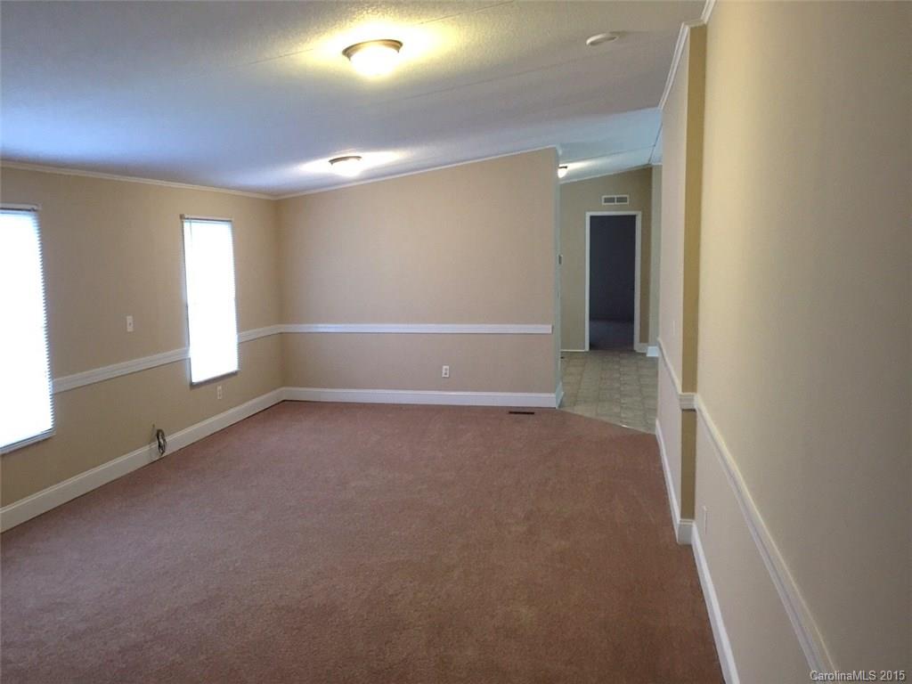 1915 Burkin Road McConnells, SC 29726 - Photo 9 of 16 an empty room with windows and entrance
