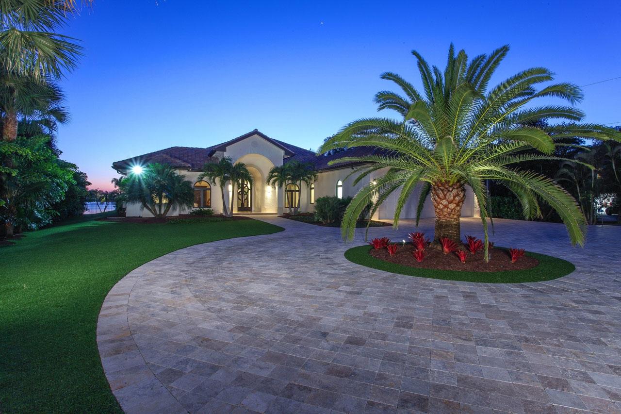 202 West Riverside Drive Jupiter, FL 33469 - Photo 1 of 39 Exterior Front Night