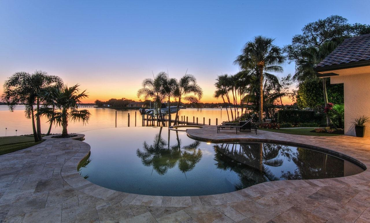 202 West Riverside Drive Jupiter, FL 33469 - Photo 2 of 39 Pool/spa sunset view