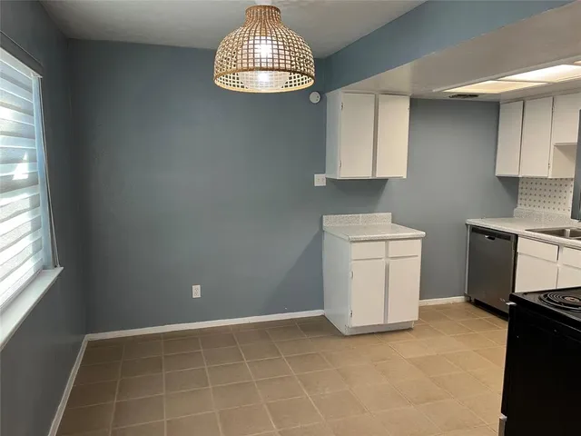 a view of kitchen and utility room
