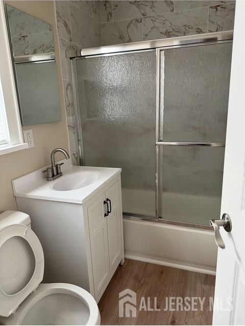 165 Emerson Street, Unit 2 Carteret, NJ 07008 - Photo 7 of 10 a bathroom with a sink toilet and shower