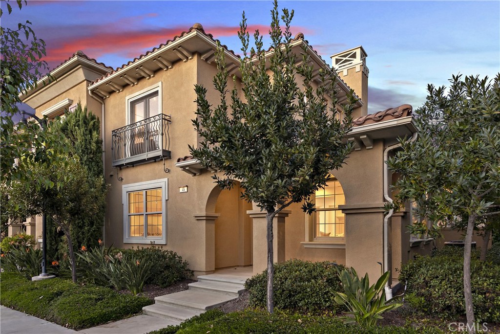 a view of a house with a tree