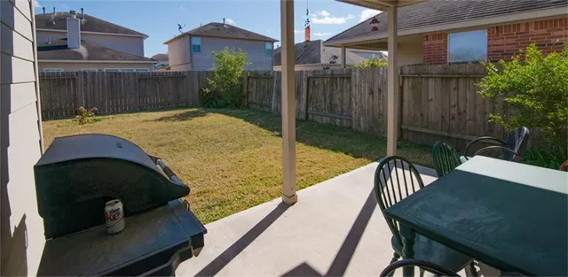 a view of a balcony with a potted plants