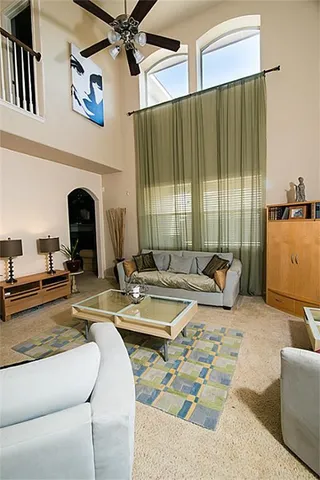 a view of a livingroom with furniture and rug
