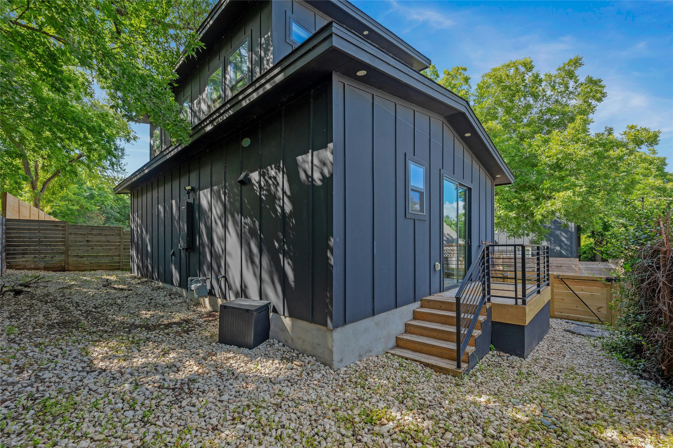 4606 Ledesma Road, Unit 2 Austin, TX 78721 - Photo 26 of 33 Modern architecture defines this dwelling, complemented by natural surroundings and a private backyard.
