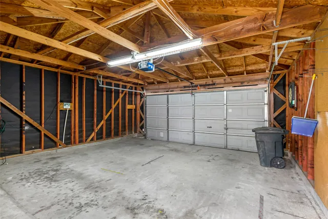 a view of a room with wooden walls