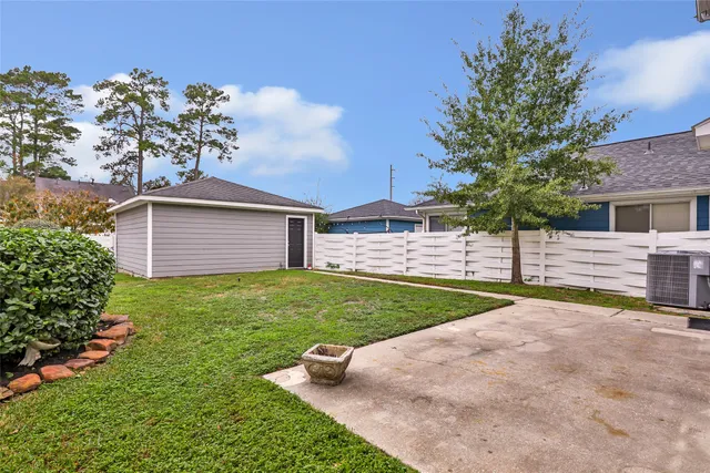 a view of a backyard with a garden