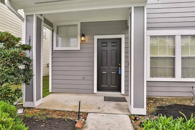 a front view of a house with a garage