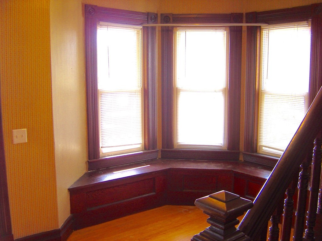 11 High Street Ware, MA 01082 - Photo 4 of 14 a bathroom with a bathtub and next to a window