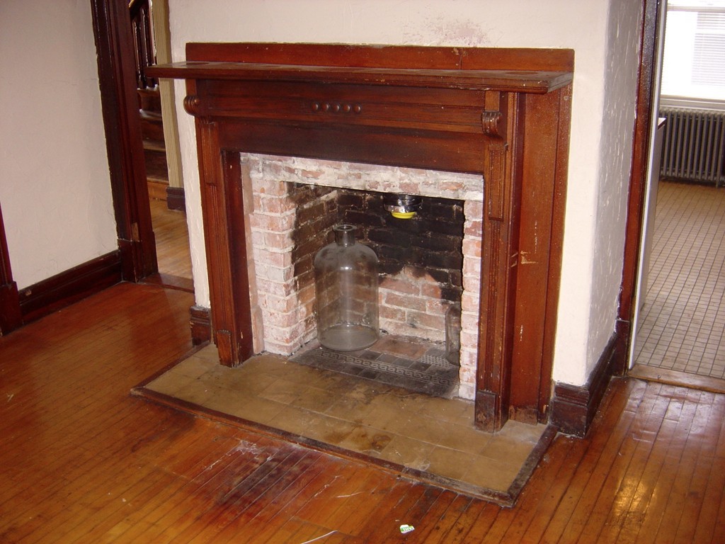 11 High Street Ware, MA 01082 - Photo 7 of 14 a view of fireplace and wooden floor