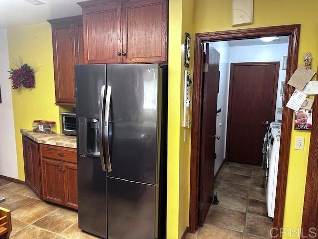 12993 Old Barona Road Lakeside, CA 92040 - Photo 13 of 48 a kitchen with a refrigerator and a sink