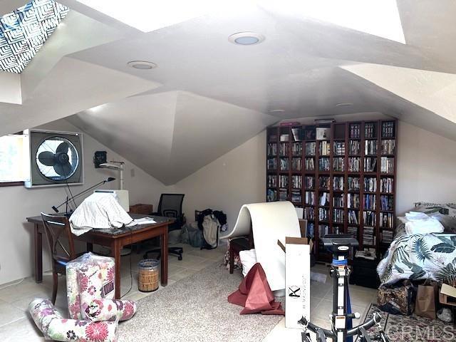 12993 Old Barona Road Lakeside, CA 92040 - Photo 14 of 48 a living room with furniture a rug and gym equipment