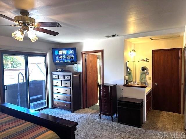 12993 Old Barona Road Lakeside, CA 92040 - Photo 17 of 48 a bedroom with furniture and a window