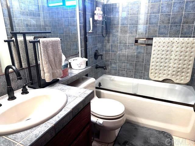 12993 Old Barona Road Lakeside, CA 92040 - Photo 18 of 48 a bathroom with a sink toilet and shower