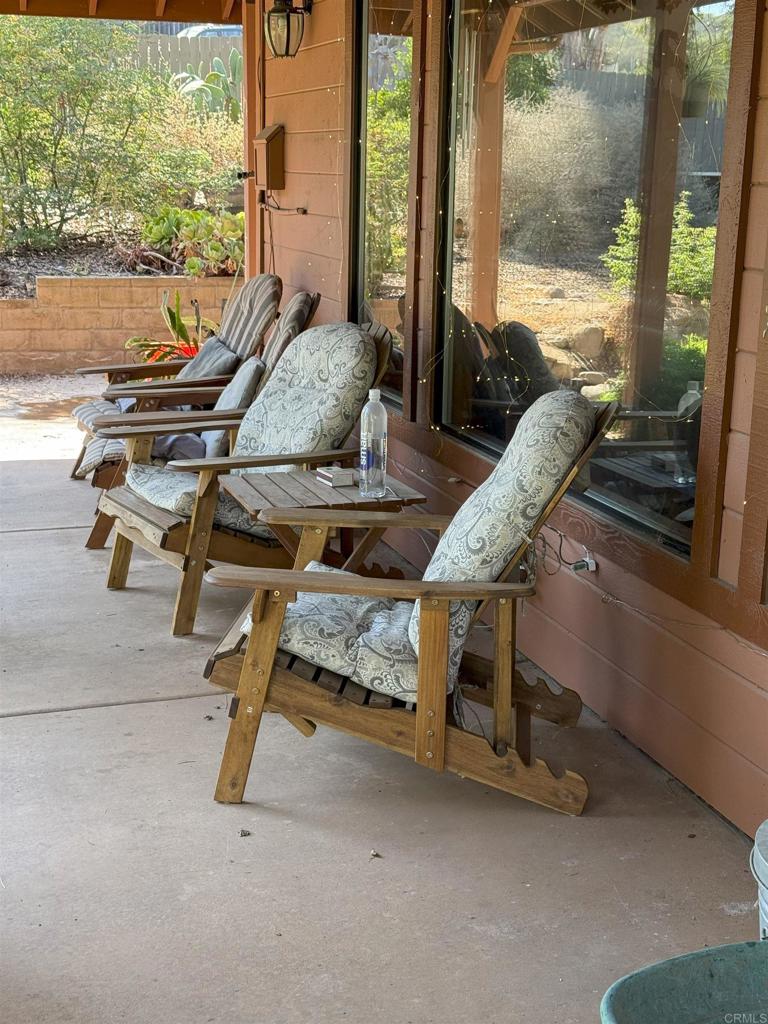 12993 Old Barona Road Lakeside, CA 92040 - Photo 44 of 48 a living room with furniture and a large window
