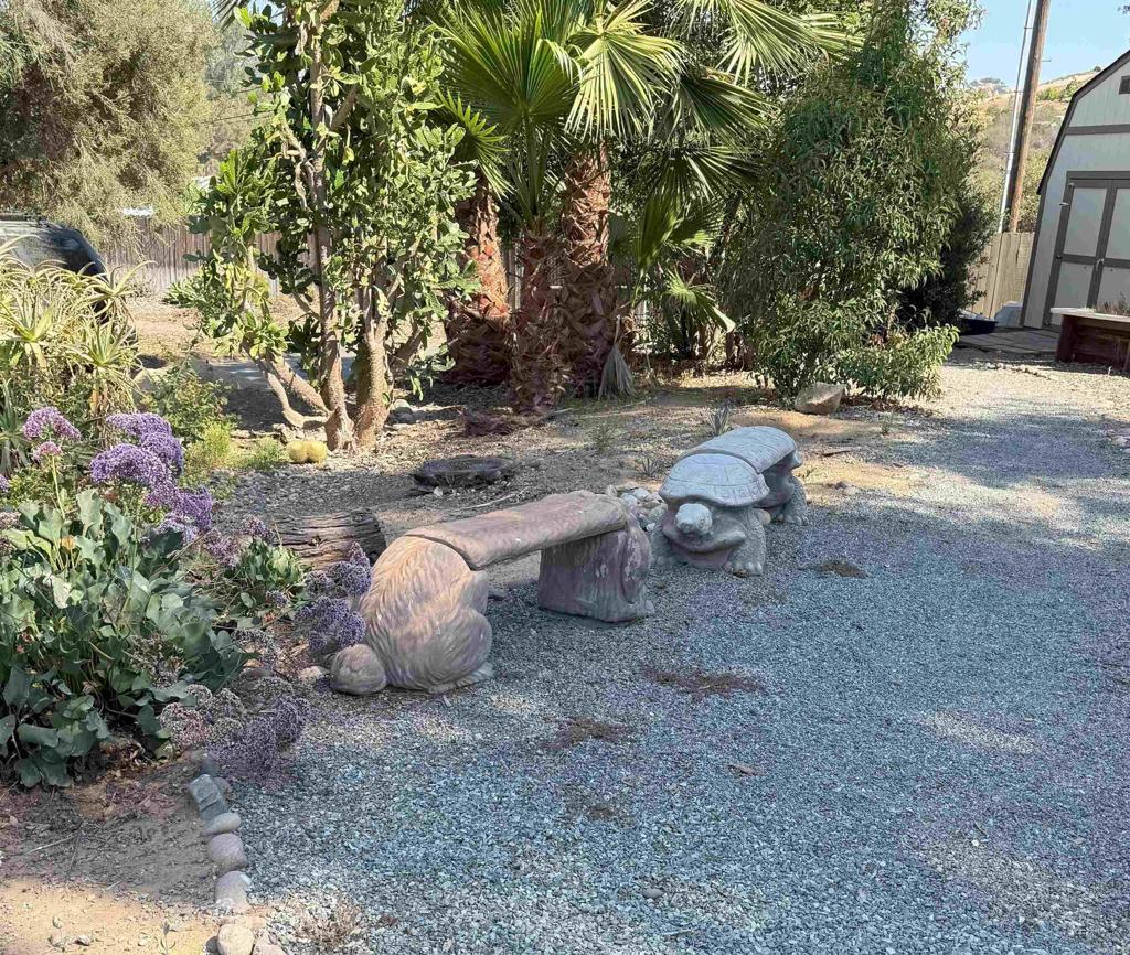 12993 Old Barona Road Lakeside, CA 92040 - Photo 47 of 48 a backyard of a house with table and chairs