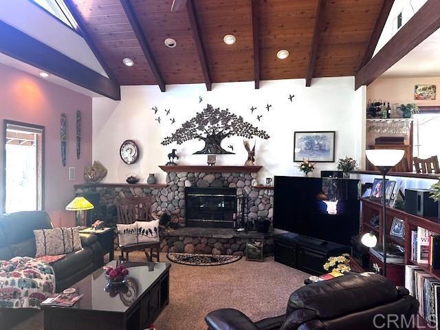 12993 Old Barona Road Lakeside, CA 92040 - Photo 6 of 48 a living room with furniture and a fireplace