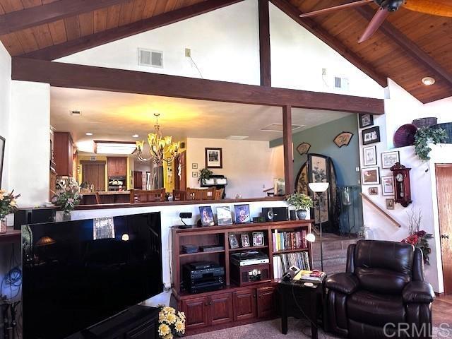 12993 Old Barona Road Lakeside, CA 92040 - Photo 7 of 48 a kitchen with stainless steel appliances kitchen island granite countertop a stove and cabinets